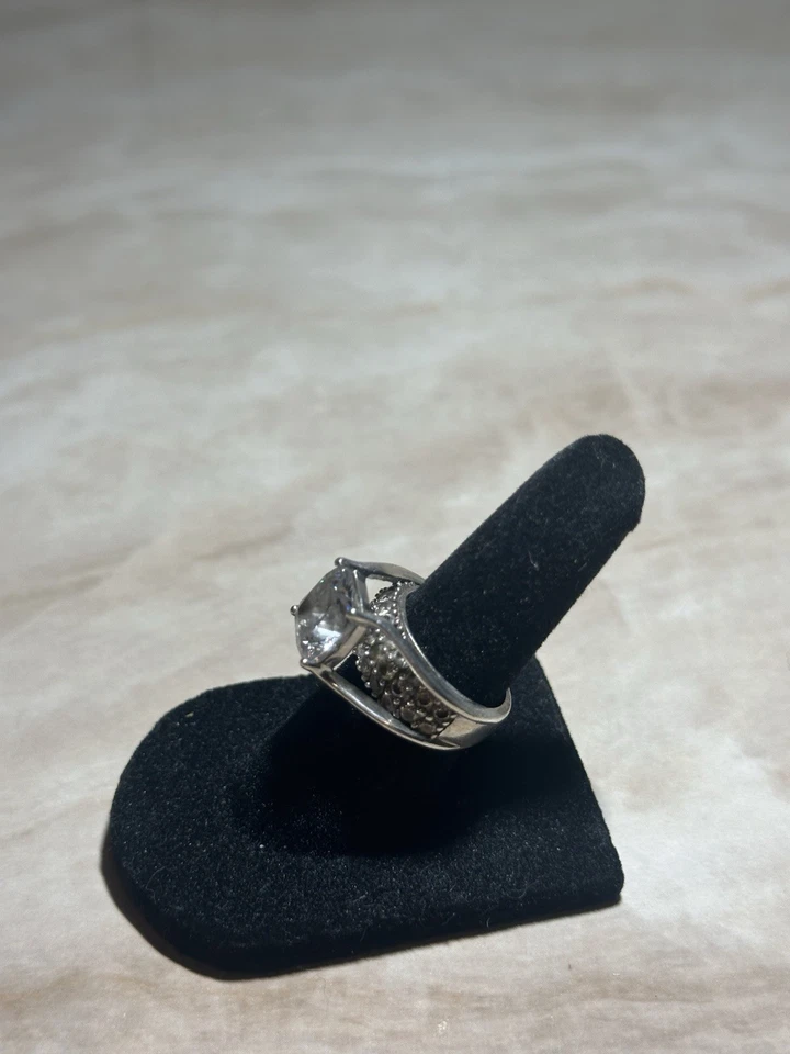 sterling silver ring with a large central cubic zirconia stone and small stone 5 - Image 2 of 4