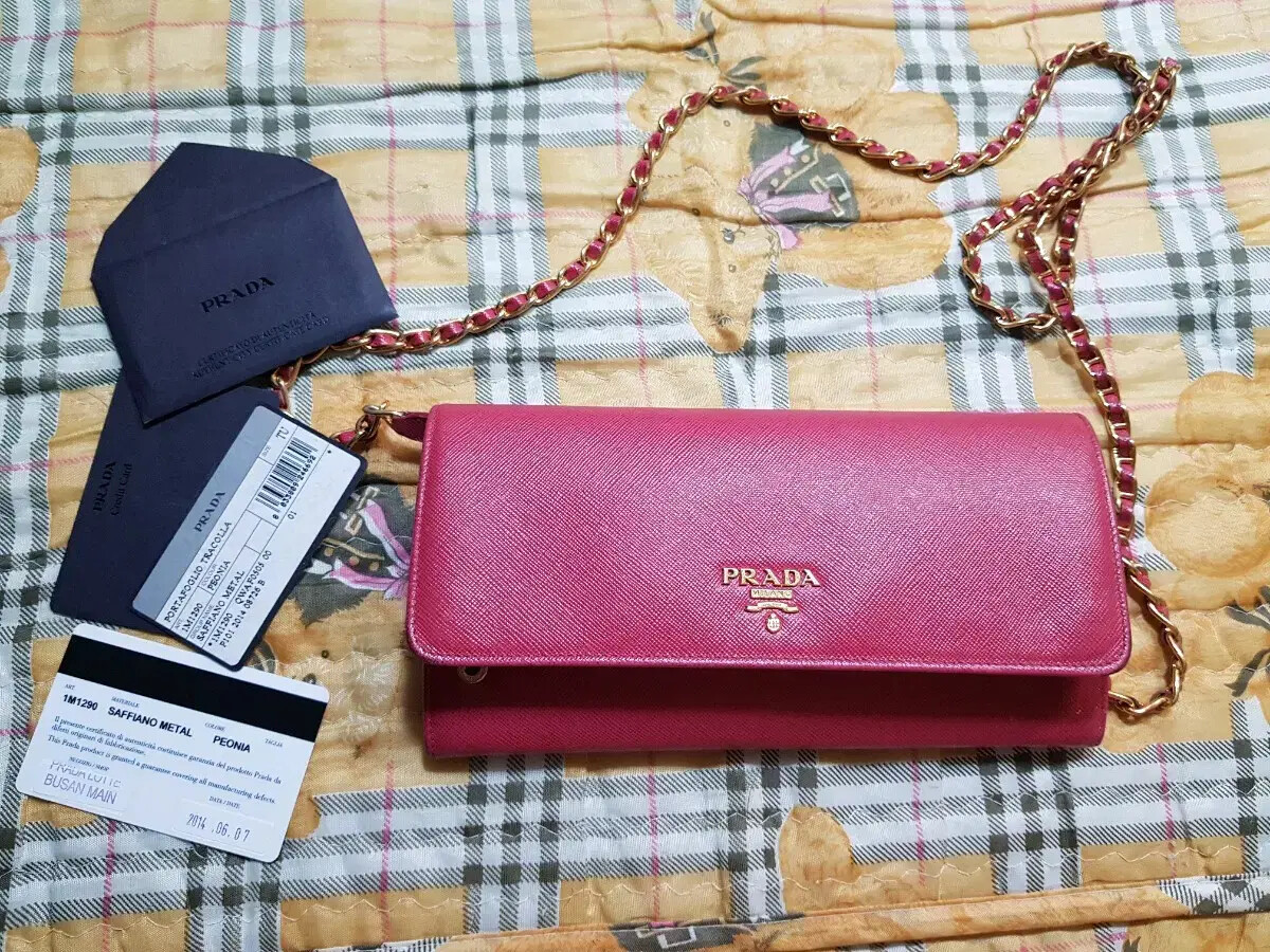 Prada Saffiano leather crossbody bag with iconic logo