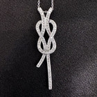 18K WHITE GOLD - PAVE DIAMOND (.45Ct) INFINITY KNOT PENDANT NECKLACE — photo 2