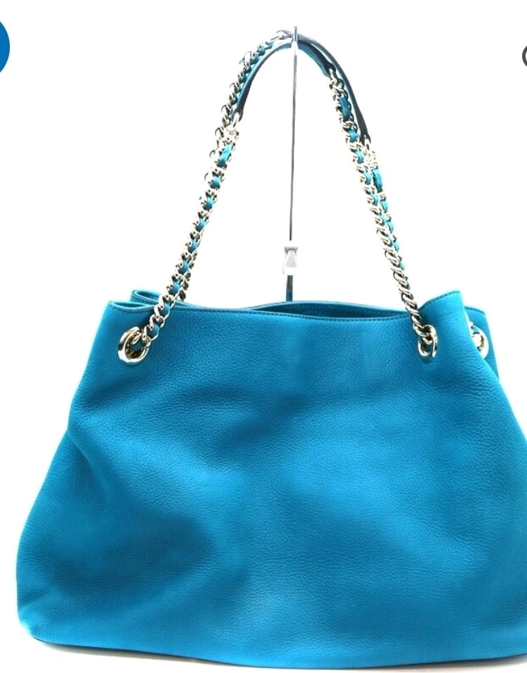 Bolso de Hombro Gucci Cuero Turquesa con Logo GG Con El Bolso Oficial de Lona Foto 2 de 4