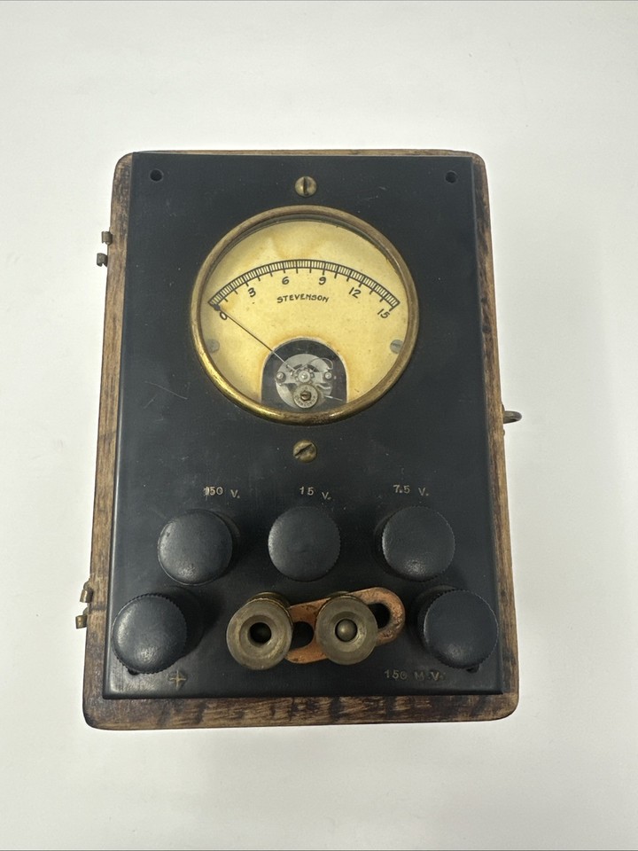A beautifully aged early-1900s galvanometer/voltmeter that looks like it belongs in a Victorian mad-scientist's lab — fully displayable as sculpture.