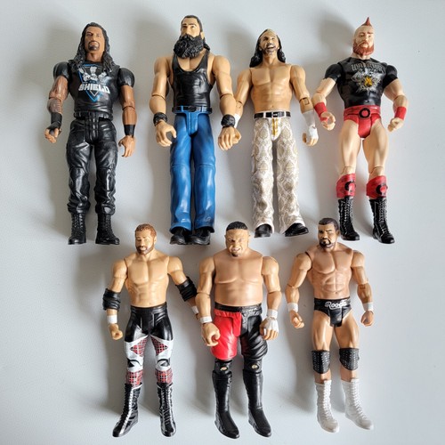 7 WWE Mattel Wrestling Action Figures Roman Reigns Matt Hardy Luke Harper Samoa