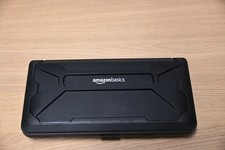 AmazonBasics Black Hard Shell Case for Nintendo Switch with Game Card Storage