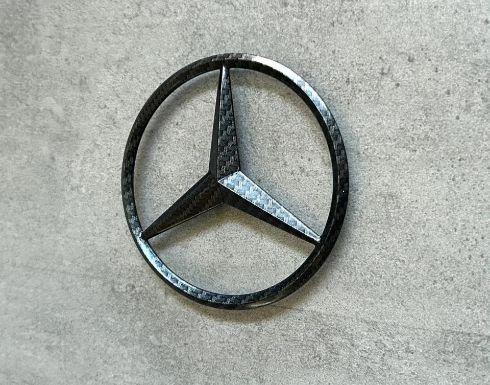 Mercedes-Benz GL550 ML350 mate fibra de carbono puerta levadiza trasera emblema OEM maletero estrella Foto 3 de 4