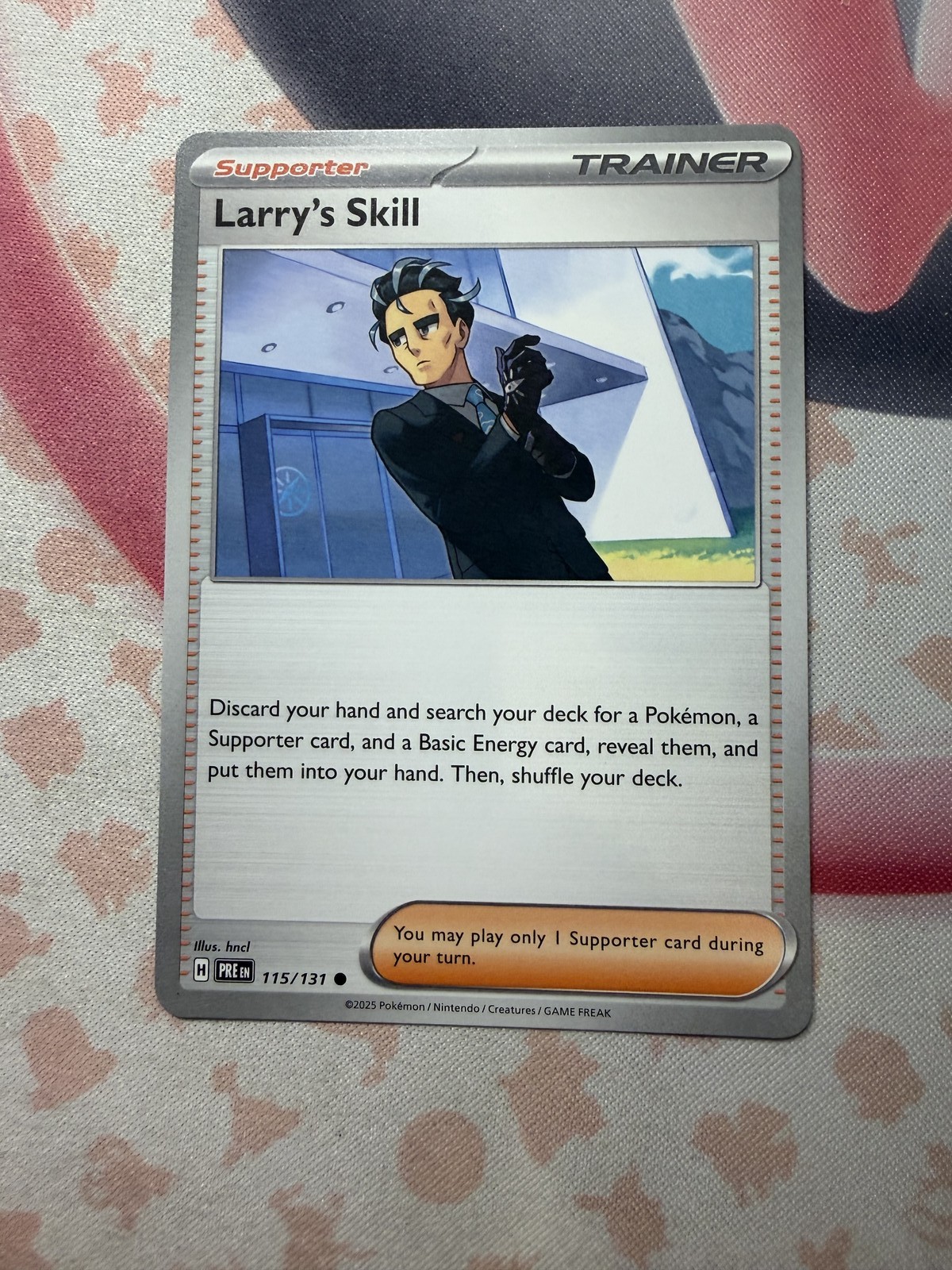 Larry's Skill - Common SV: Prismatic Evolutions 115/131 NM English Pokemon Card