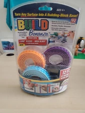 Build Bonanza 12 Feet Building Block Peel & Stick Tape, Pur/Ora/Bla/Blue. New