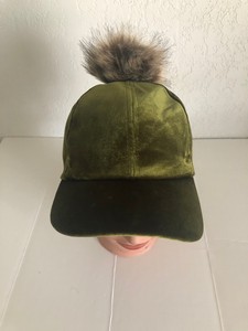 hat with ball on top