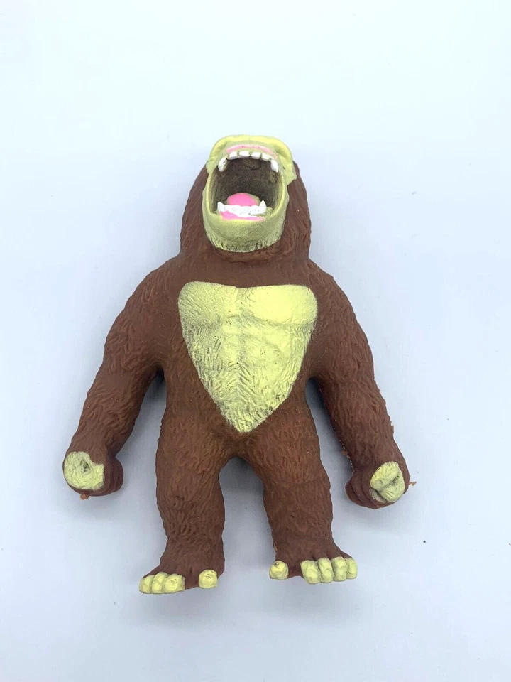 Liberación de Estrés y Ansiedad - Terapia de Manos Mono Marrón y Verde Foto 2 de 4