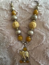 tibetan antique jewelry from Hong Kong. Hand carved