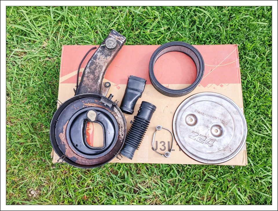 ✅ Limpiador de filtro de aire de carrocería dura Nissan Pickup 1985 1986 1987 D21 4 cilindros OEM Foto 2 de 4