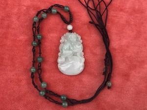 VINTAGE CHINESE JADE MONKEY PENDANT ON SILK THREAD WITH JADE BEADS. 1950’S.