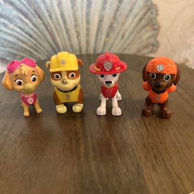 Lot of 4 Paw Patrol Pups Toy Action Figures 