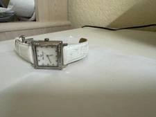 Ladies Lucien Piccard  27034PK Genuine diamond bezel and dial watch watch