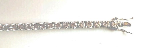 RelavenO Sterling Silver Tennis Bracelet crafted with Round Cut Cubic Zirconia - Picture 6 of 12