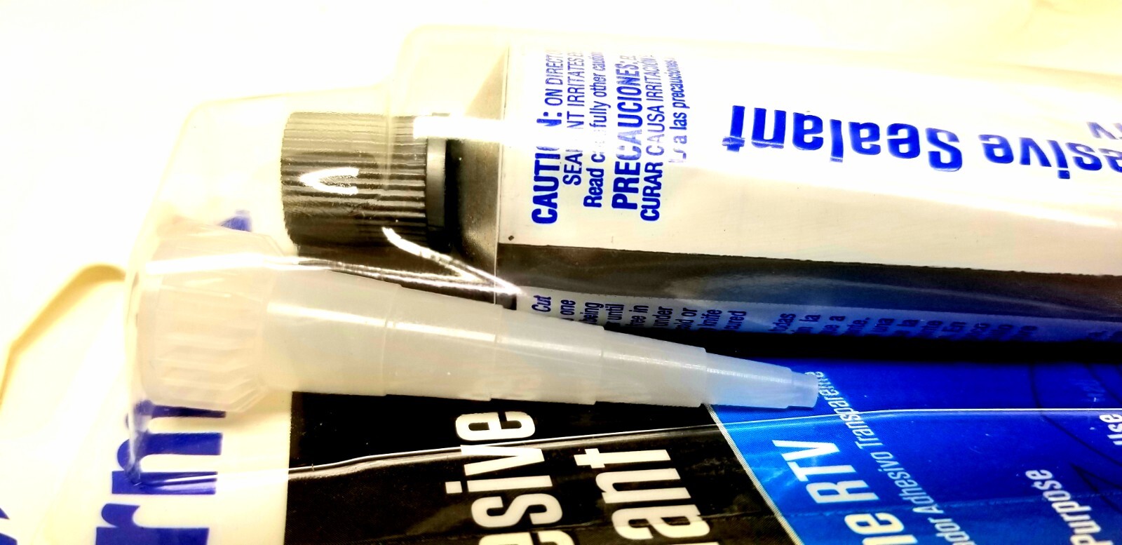 PERMATEX CLEAR ADHESIVE SEALANT SILICONE INTERIOR EXTERIOR USE SEALED