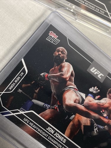 2024 TOPPS NOW UFC JON JONES #34 UFC HEAVYWEIGHT CHAMPION RETAINS VIA TKO (Qty) - Picture 4 of 5