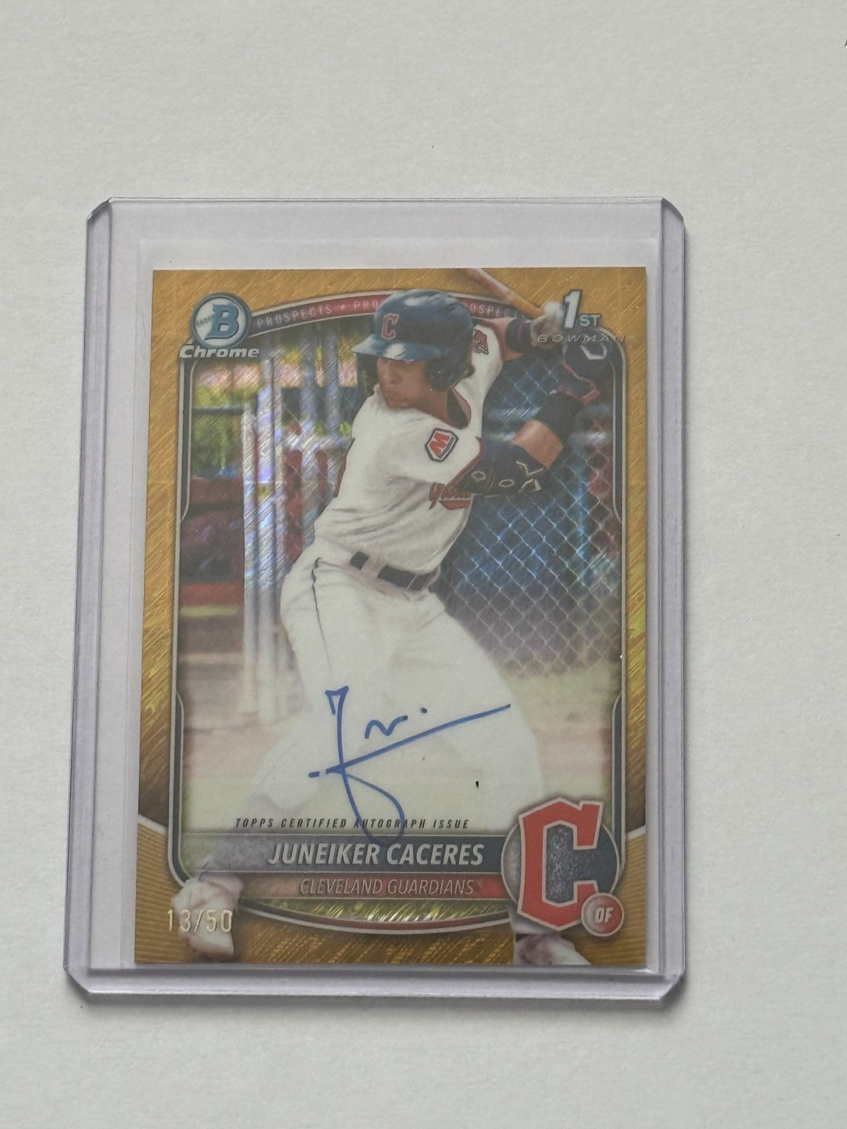 2025 Bowman Chrome Guardians Juneiker Caceres 1st Gold Shimmer Auto 13/50