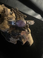 Silver cuff bracelet bezel-set oval purple gemstone accent