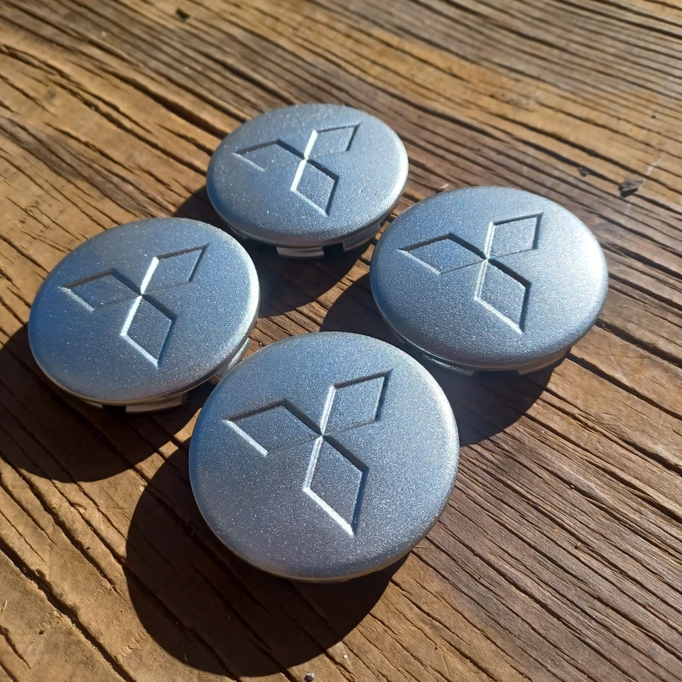 Juego de 4 tapas centrales Mitsubishi Eclipse Galant, 2004-2011 p/n MR554487 repintadas Foto 2 de 3