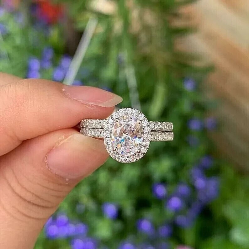 Stunning 2Ct Oval Cut Simulated Diamond Halo Wedding Ring 14K White Gold Plated