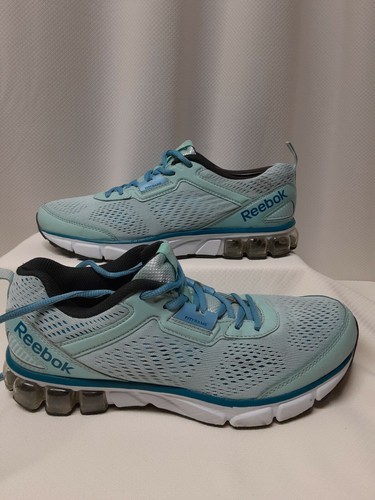 cardi b gold sneakers