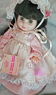 (D8) Royal Doll really gorgeous porcelain-like 10 in doll with basket and bonnet