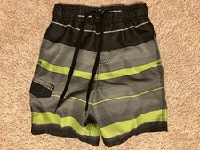 Kanu Surf swim trunks Boys Size 5/6 Black Green Drawstring Pocket Board shorts