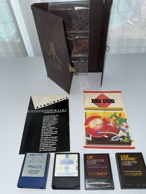 Atari 8-Bit 400/800/XL/XE Game Cartridge Lot w/ Binder Miner 2049er Qix + More