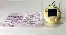 Vintage Tamagotchi Angel 1997 Yellow Comes with Original Paper Work Untested