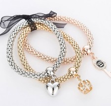 Mala Fama Key and Crown set. Charm Bracelets