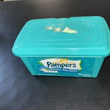 Empty Green Pampers Baby Wipes Container