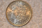 1884-O  BU/UNC MORGAN DOLLAR.