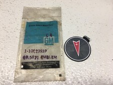 GM NOS 1984-1986 Fiero Grand Am Pontiac Wheel Cover Emblem 10023937
