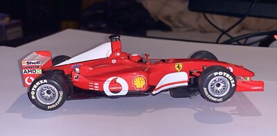 Carrera Evolution 25706 Ferrari F2002 F1 V10 Nr. 1 Michael Schumacher Slotcar