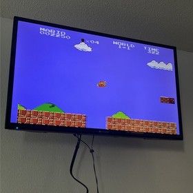 Authentic Nintendo (NES) Lot Of 18 Games, 2 Consoles, 4 Controllers And More