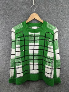 green checkered sweater