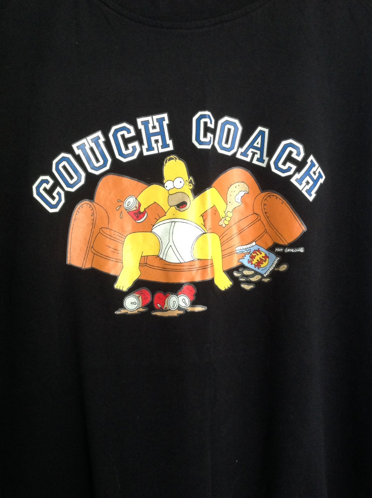 T shirt The Simpsons Holmer divano coach unisex nera nuova
