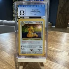 Pokémon TCG Fossil Unlimited Dragonite Holo Rare 4/62 CGC 8.5 1999