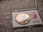 1988  1 oz American Eagle silver dollar (Uncirculated)  Rainbow on Edges