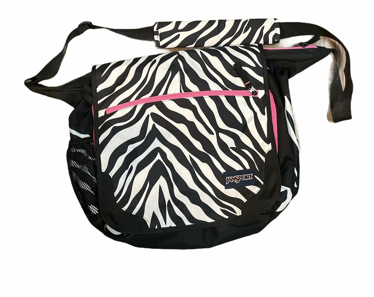 jansport elefunk messenger bag review Central Adaptive Crossbody With a whole bunch of attachment points Blue and navy Jansport messenger