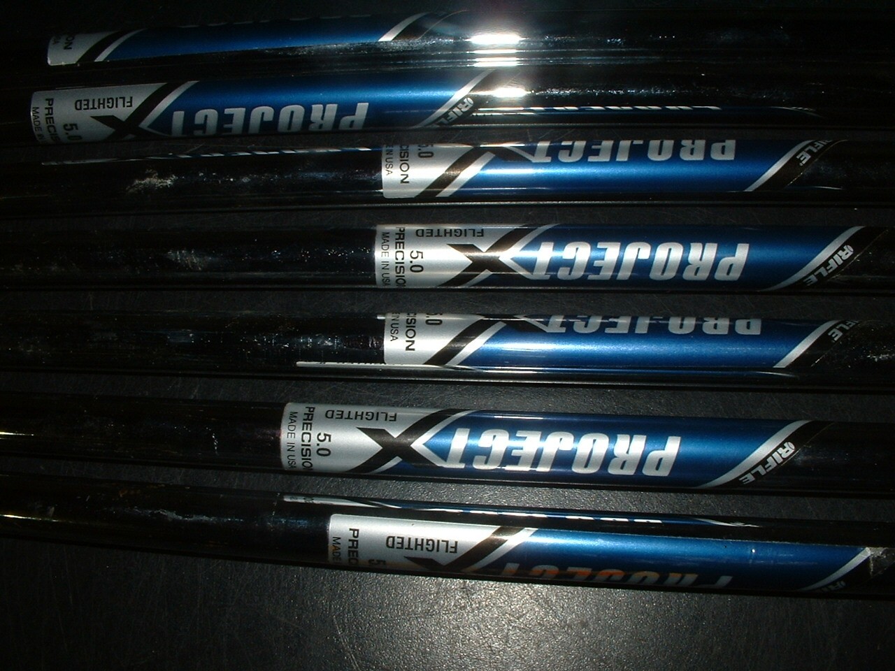 7 Project X Rifle 5.0 Iron Shafts. 5 have grips. 4 other shafts total