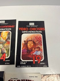 Lot of 8 Vintage Atari 2600 Games w/Manuals Tested Yars Surround Asteroids Comba