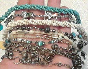 Bracelets. 8 - 10 inches blue beaded button clasp, lions, jingle bells, crystals