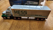HESS TOY TRUCK - 1987 TOY TRUCK BANK-TRACTOR TRAILER W/OIL DRUMS