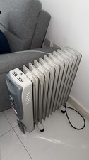 portable heater used perfect condition warms up the house very quickly!
