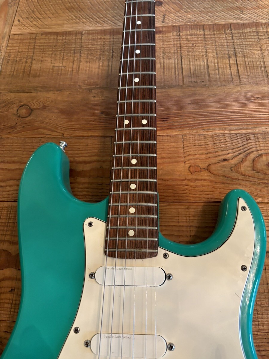 ギター Fender USA Stratocaster Plus Lace Sensor Fender USA Strat Plus Deluxe Reliced Sunburst Finish 1995 W