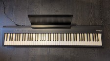 Roland FP-30X Digital Piano with sheet music stand and power supply