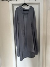 casual gray hooded long cape with a button closure