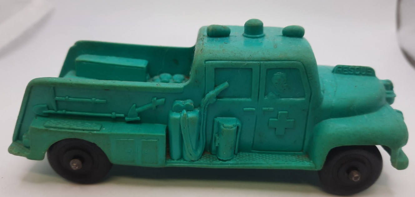Auburn Rubber Fire Truck , Fireman Figure & Green Rescue Truck Vintage 1950's