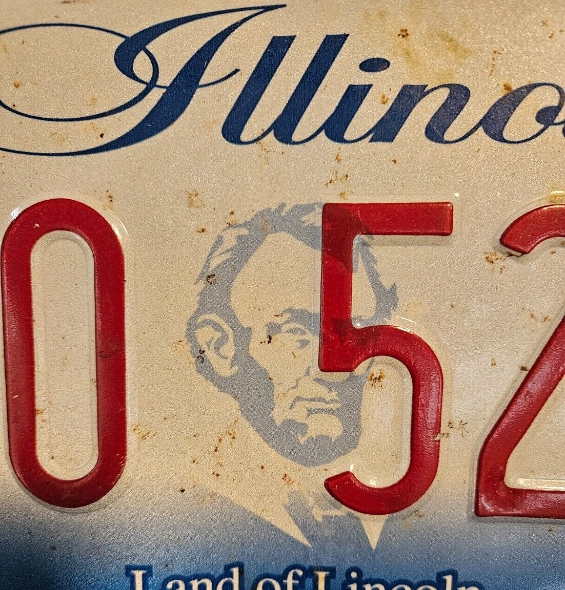 2000s Illinois 720 5207 Land of Lincoln License Plate had some